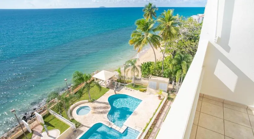 Beachfront Penthouse with Ocean and Sunset Views at Pelican Reef #703 - Image 1