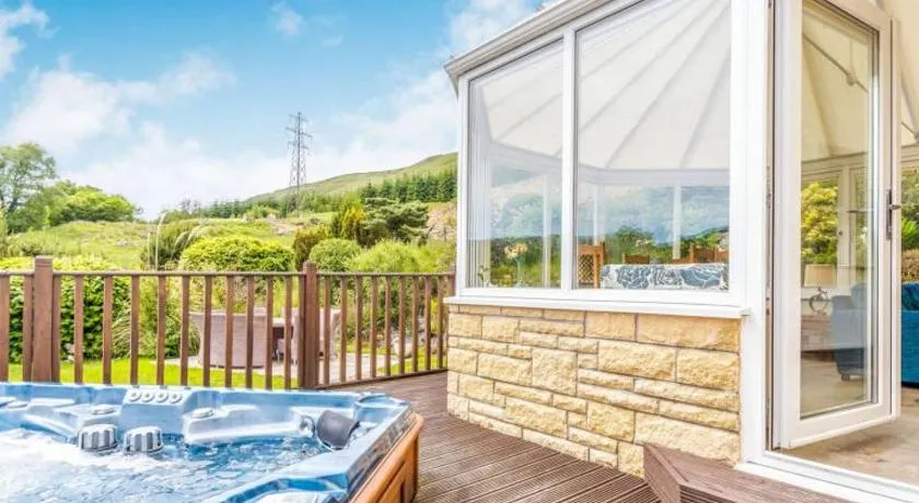 3 Bedroom luxury home, hot tub, stunning views of Killin, sitting on the River Dochart - Image 1
