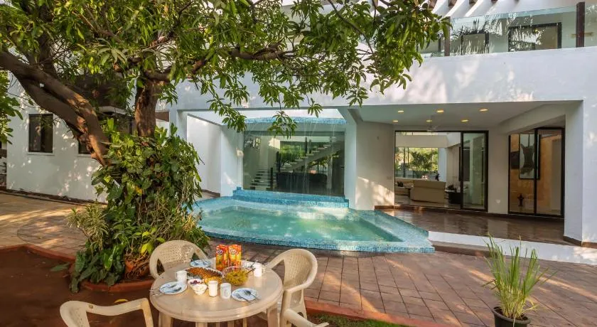 SaffronStays Vedanta - 5BR luxury villa with plunge pool, game zone, lawn & Tungarli Lake nearby - Image 1