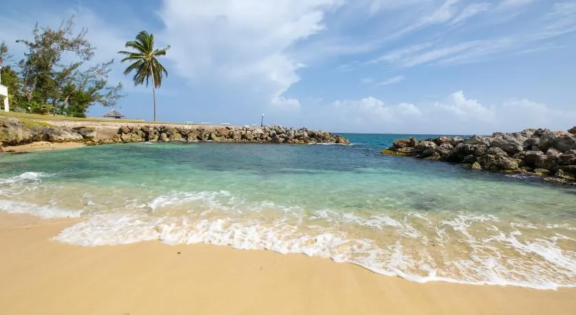 Jamaica Time Driftwood at Sea Palms 3BR 3BA Condo in Ocho Rios with Pool and Beach Front with Views ONLY 10 Mins from Ochi Intl Airport Direct flight from Miami - Image 1