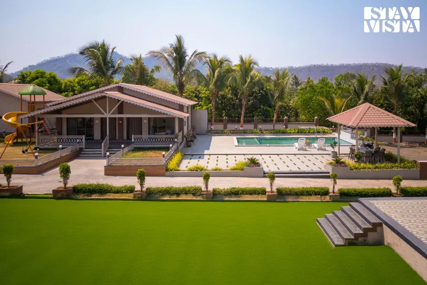 StayVista at Aura Farmstay with Pool & Lawn - Image 1