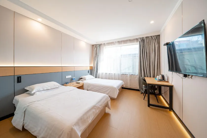 Aishang Xinglong Hotel - Image 1