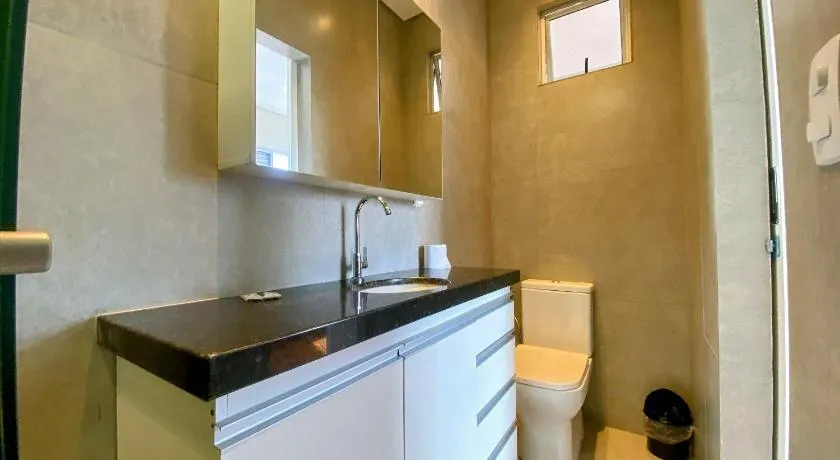 Prado Premium Lofts e Kitnets com Ar-Condicionado e TV Smart - Image 1