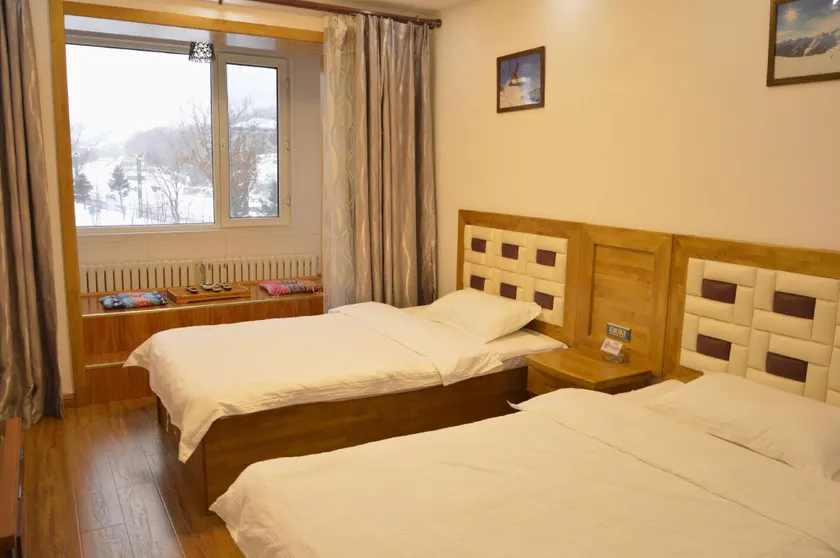 Yabuli Qingyun County Xin Ding Apartment Hotel - Image 1
