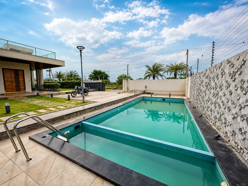 Bluewater Farms 2BR Villa With pool by Homeyhuts - Image 1