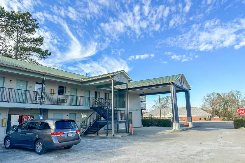 Garden Inn & Suites - Image 1