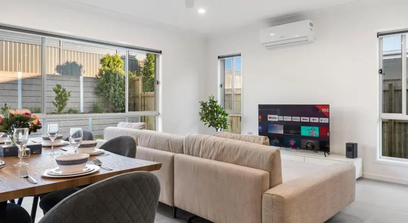 Relax Ready 4BR Near Bayside and Shops Workspace - Image 1