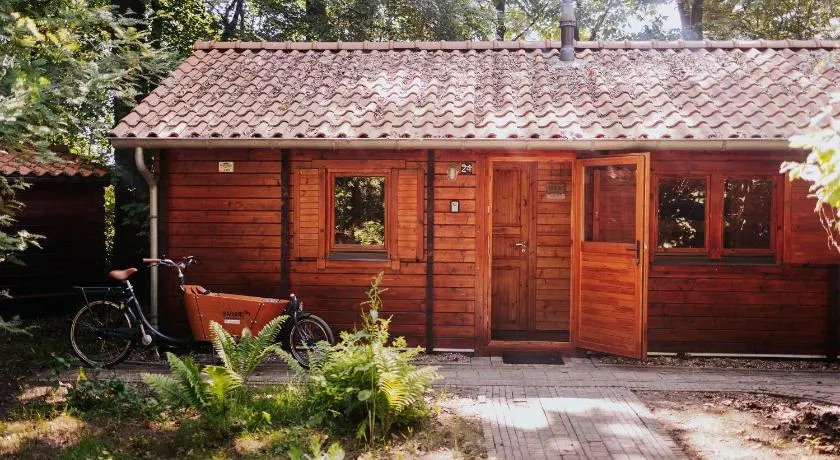 Sfeervol houten huisje met fijne buitenruimte op de Veluwe - Image 1