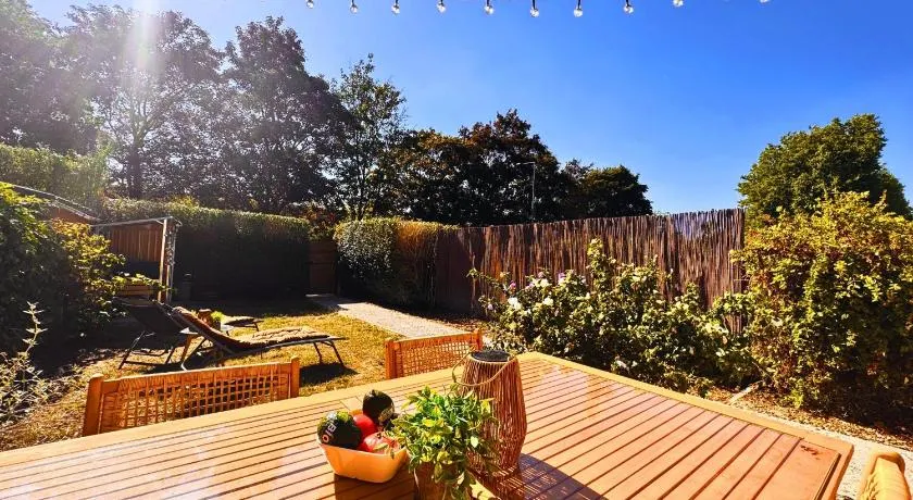 Maison Langevin 2-Bedroom House with Cozy Garden & Patio - Image 1