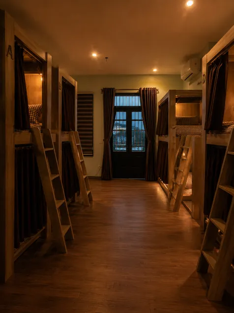 Mountain Goat Hostel Cozy Wooden Dorms Old Quarter Trang An - Image 1