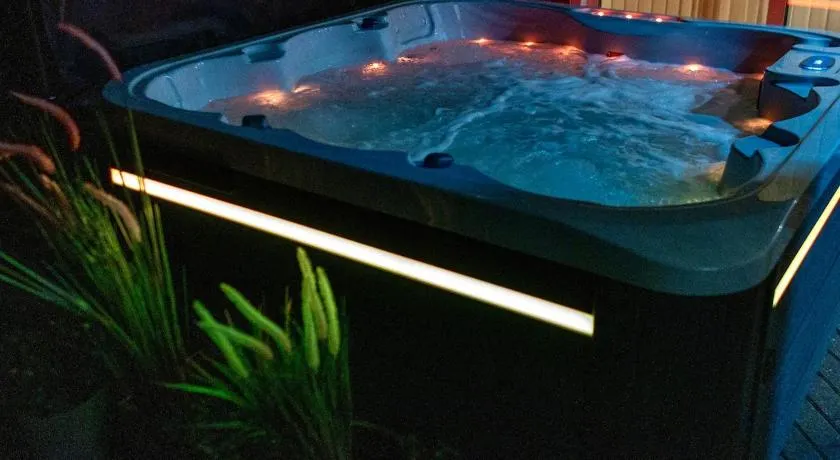 Luxury Spa Retreat with HotTub, Sauna and Massage Chair - Image 1
