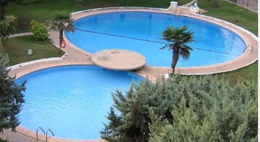 Acogedor apartamento en Daimús a 150 metros de la playa con parking privado y piscinas comunitarias - Image 1