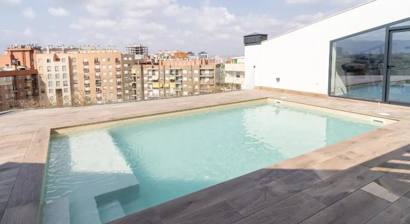 Apartamento de diseño con piscina y gimnasio By ElConserje - Image 1