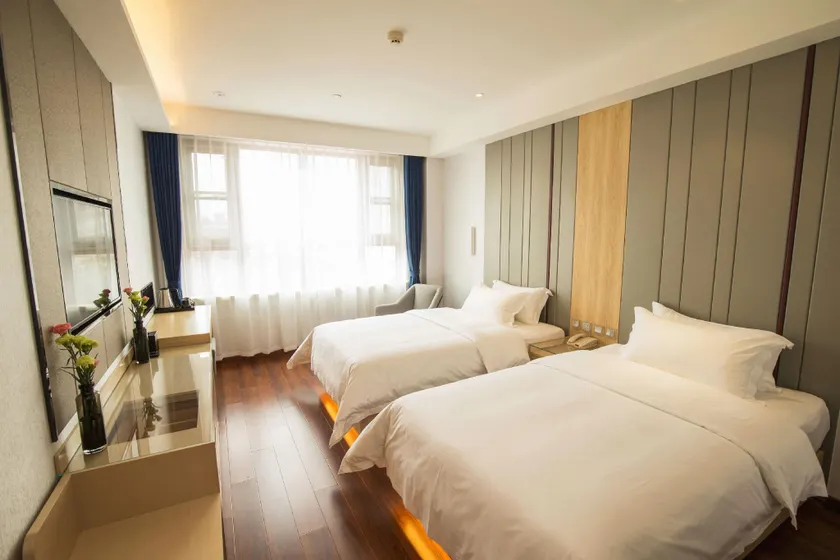 Huamao Business Holiday Hotel (Heping West Road Branch) - Image 1