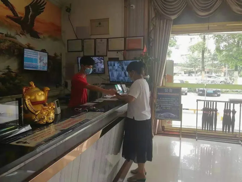 Jing Hong Shang Wu Hotel - Image 1