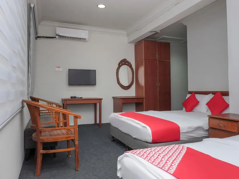 OYO 90120 MI Hotel Dungun - Image 1