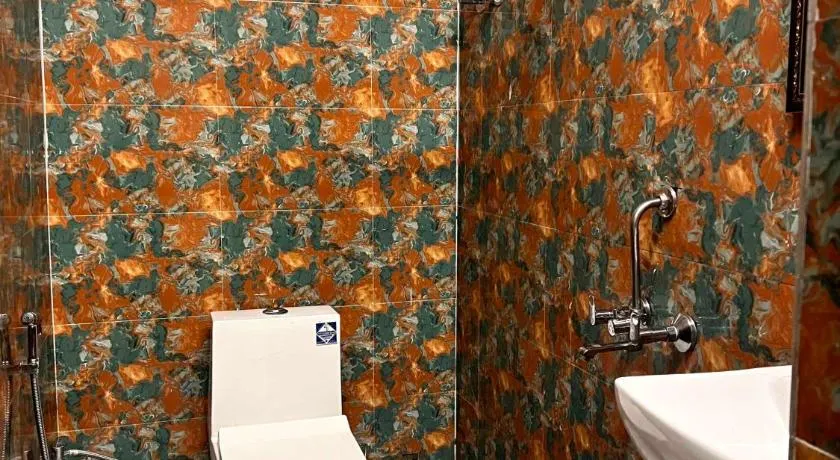 Hotel O HOME Cozy Stay - Image 1