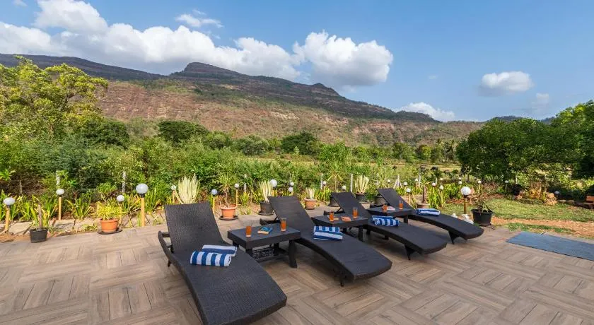 SaffronStays Vyom Farms - 2BR pool villa with orchards, bathtub, lawns & mountain sunrise views, elder-friendly stay - Image 1