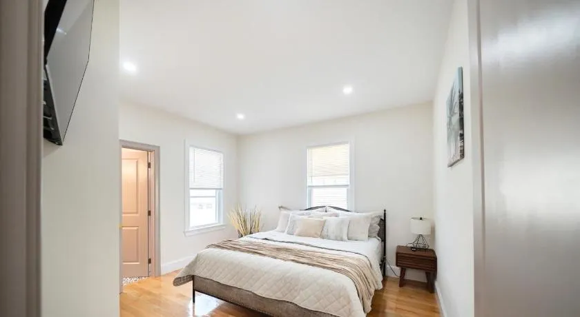 Modern 3BR & 3BA Boston Apt - Patio, Bathtub, Walk to Red Line 82 - Image 1