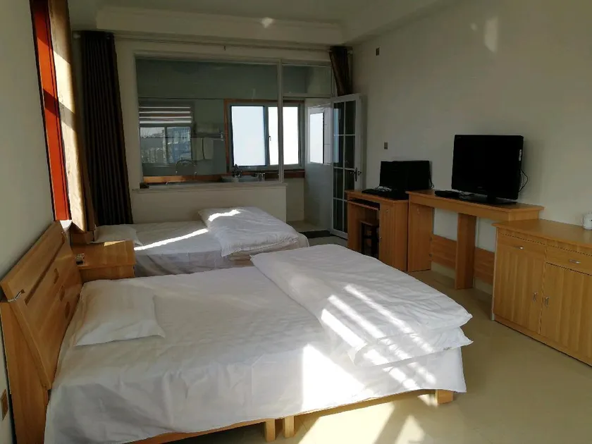 Xinjiaoyuan Hotel - Image 1