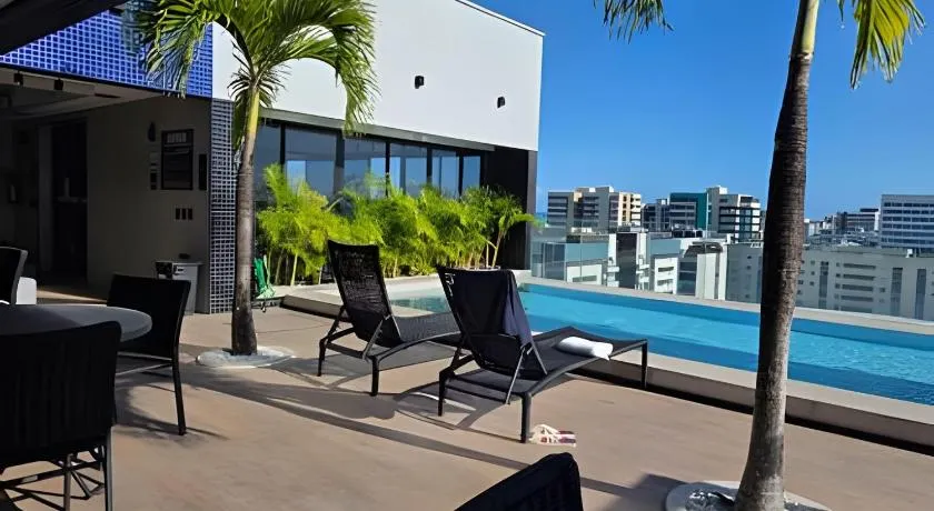 Lindo Studio com Piscina a poucos passos da Praia - Image 1