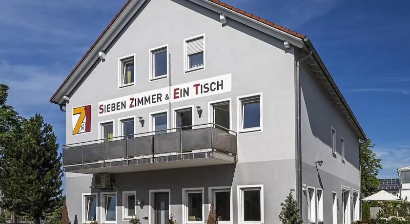 Sieben Zimmer & Ein Tisch - Image 1