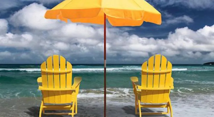 Charming SPI family condo - walking distance to the beach, Sleeps 6, Third Floor, 2026 Traveler Award - Image 1