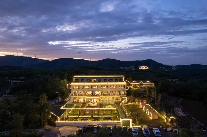QIANNA HOTEL GLORIOUS (Fuxi Mountain Guogongling) - Image 1