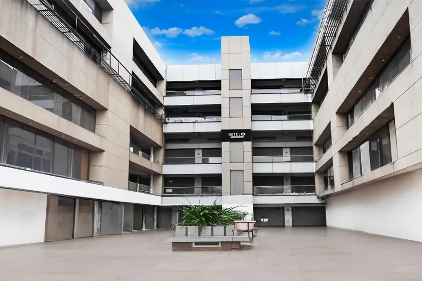 Super Hotel O Dindoli Surat - Image 1