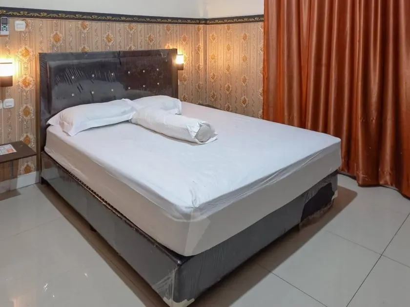 Homestay Singgasana Mitra RedDoorz - Image 1