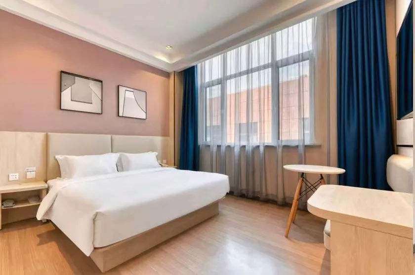 Grace Inn Hotel (Jinan Laiwu Pengquan East Avenue Yufeng Jiayuan) - Image 1