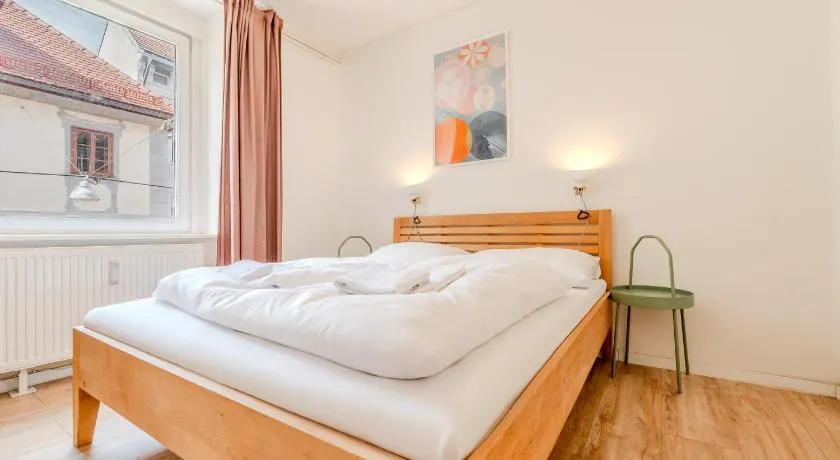 Whats-App Self-Check-IN - vibrant City Life in Graz - Image 1