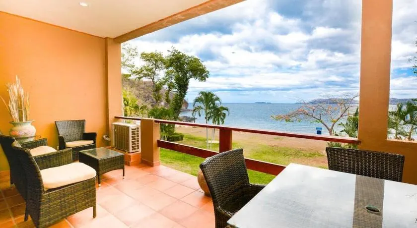 Elegant 3BR Beachfront Condo with Spacious Interior, Ocean-View Terrace & Direct Access to Playa Flamingo - Image 1
