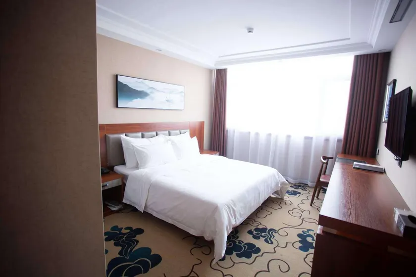 Wanlong International Hotel - Image 1