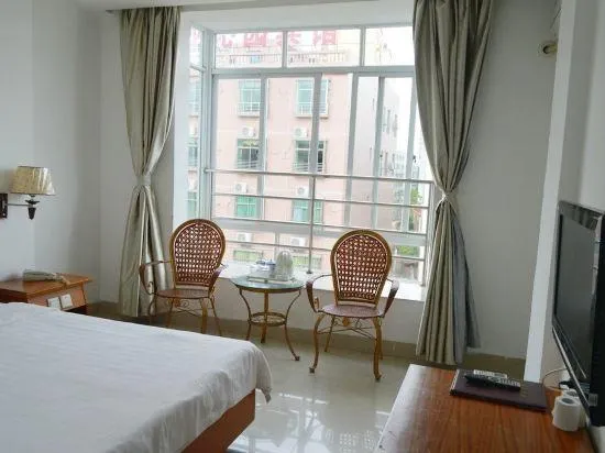 Yanhui Hotel Ding'an - Image 1