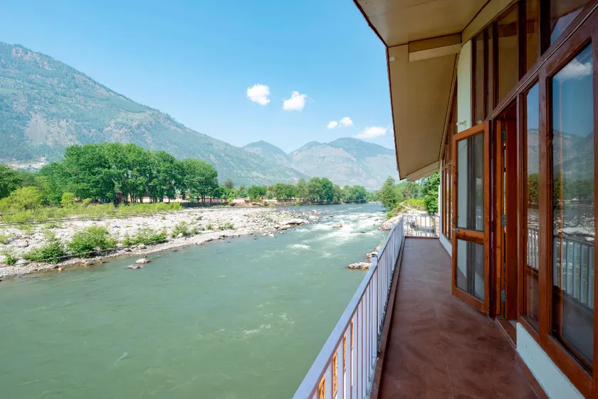 Aurora Stream view 3bhk Chateau by Roamhome - Image 1