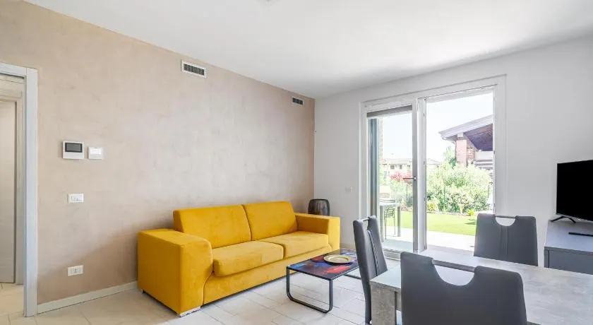 HOST4U - Garda Lake Lido Apartments With Pool, Garden and Private Parking in Garage - Image 1