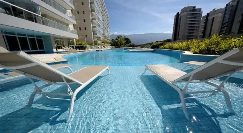 Apto Pé na Areia Sauna SPA Bertioga H43 - Image 1