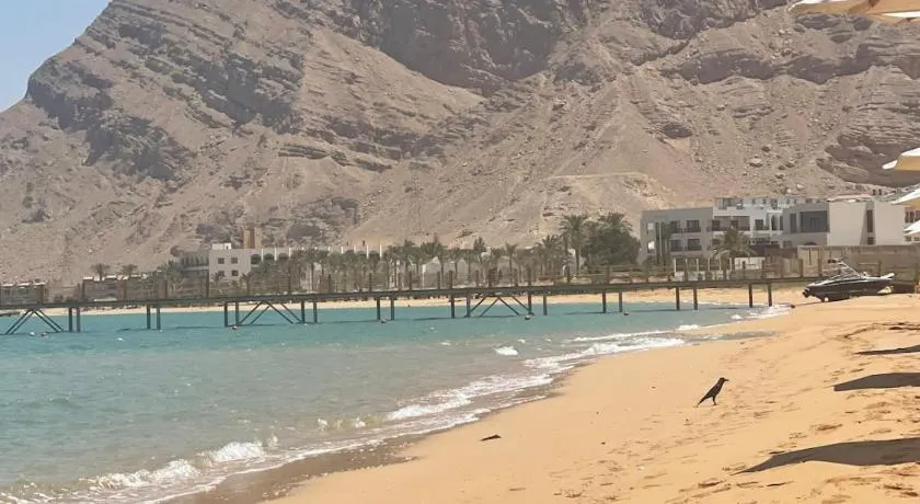 Ground peaceful chalet 3 bedroom with 6 king bed & 2 bathrooms &private garden marvelous land escape Murano resort Ain sokhna & A very beautiful sandy beach, and the beach is also very close to the chalet - Image 1