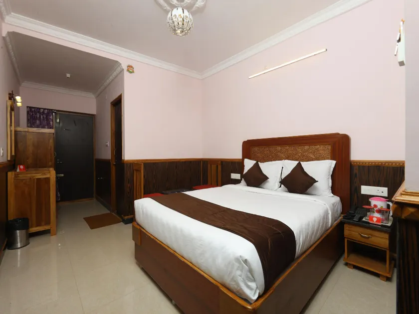 Capital O Hotel Rain Forest - Image 1