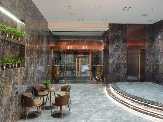 Wanrong Aijia Business Hotel - Image 1