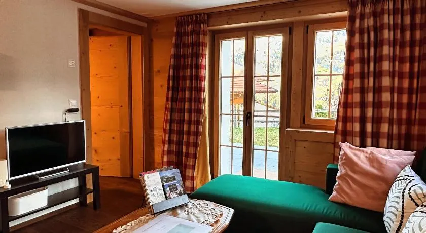 One Bedroom with mountain and garden view ground floor of Chalet Solaria - Image 1
