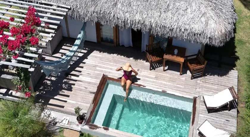 Tiki Pool's Bungalows - Image 1