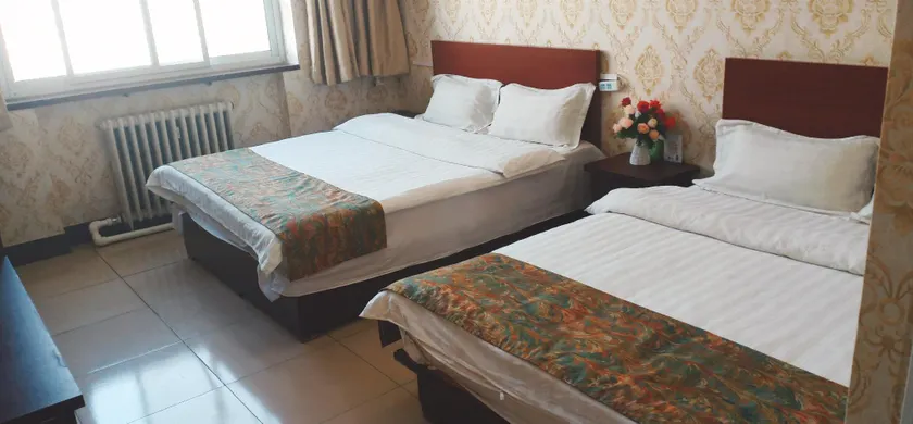 Xinyangguang Hotel - Image 1