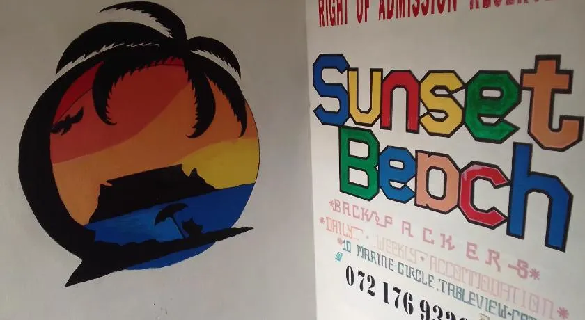 Sunset beach backpackers - Image 1