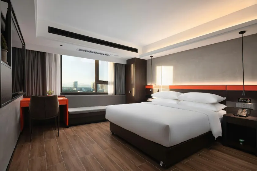 enjoy inn Wanning Hotel - Image 1