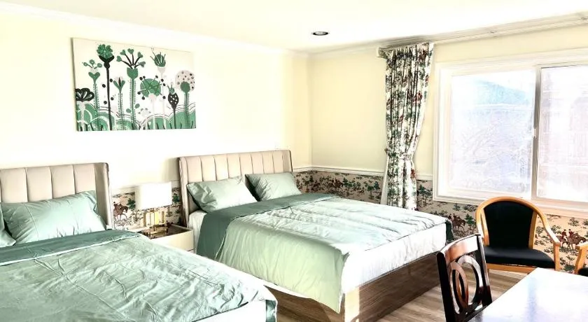 Spacious Bedroom with Two Queen Sized Bed - Image 1