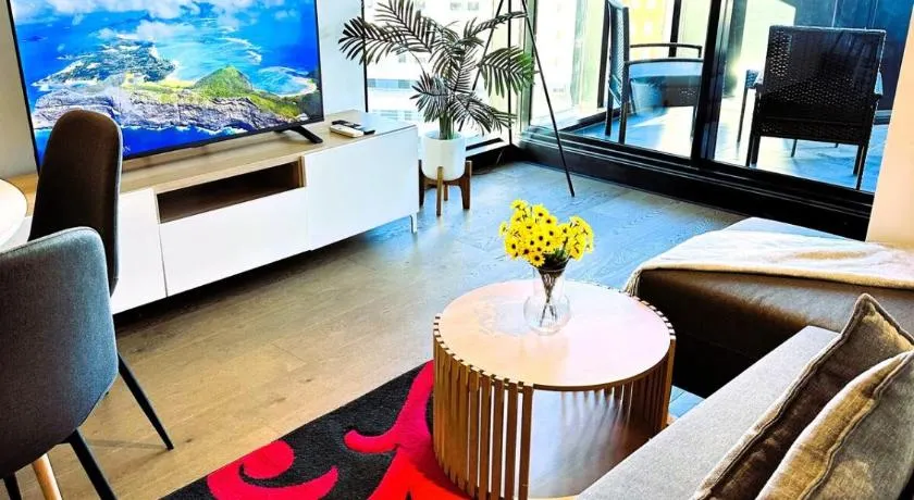ADEK Apartment North Melb-Stylish 2BR Apartment with Pool, Gym & Parking - Image 1