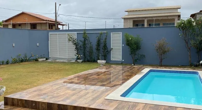 Casa Guriri com piscina ao lado da praia excelente localização - Image 1