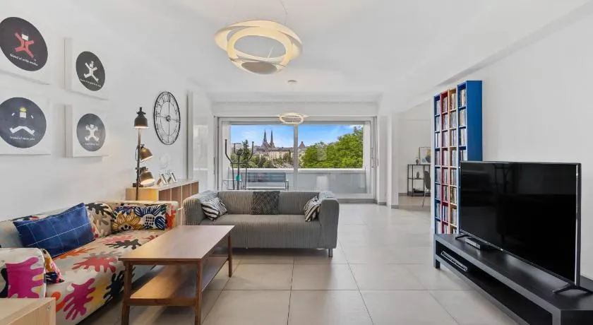 Central Lux 2BR Apt with City Views & Balcony - Image 1